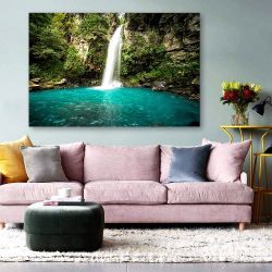 Πίνακας σε καμβά  Majestic Waterfall in the rainforest of Costa Rica