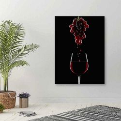 Πίνακας σε καμβά Grapes over wine glass 35*40